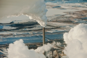 aerial shot of smokestack at oil refinery in Fort McMurray, Alberta. Image by kris krüg via Flickr