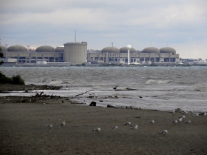 photograph of pickering nuclear plant taken from nearby beach