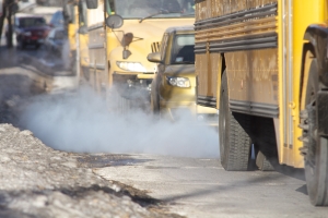 polluting school buses on road